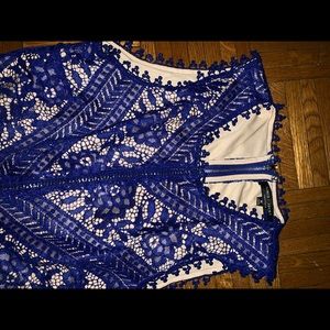 Sleeveless blue lace women’s shirt, form fitting